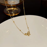Load image into Gallery viewer, Gold Plated Infinity Bow Pendant