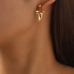 Load image into Gallery viewer, Gold Plated Infinity Bow Drop Earrings
